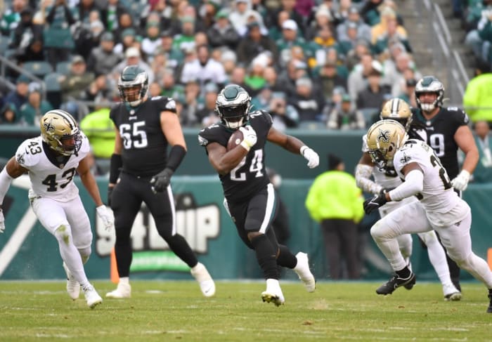 Nov 21, 2021; Philadelphia Eagles running back Jordan Howard (24) runs the football against the New Orleans Saints. Mandatory Credit: Eric Hartline-USA TODAY Sports